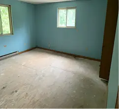 Blue-walled bedroom emptied after the clear-out